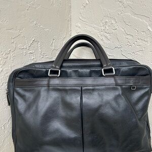 Tumi business bag or briefcase designed for work and travel Black Leather